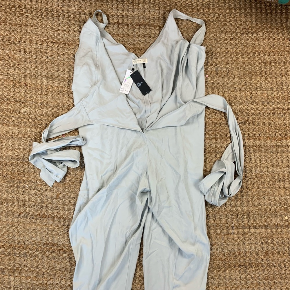 Romper, legs cut off in picture